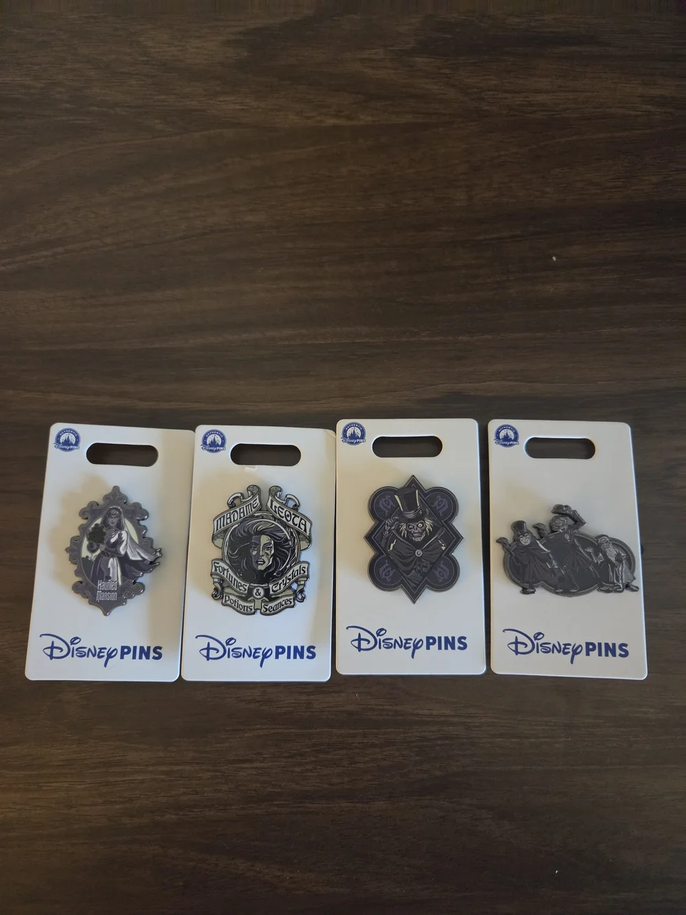 2025 Disney Parks Haunted Mansion 4 Pin Set Hatbox, Hitchhiking Ghost, Leota NEW